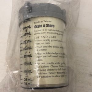 Pampered chef grate and store